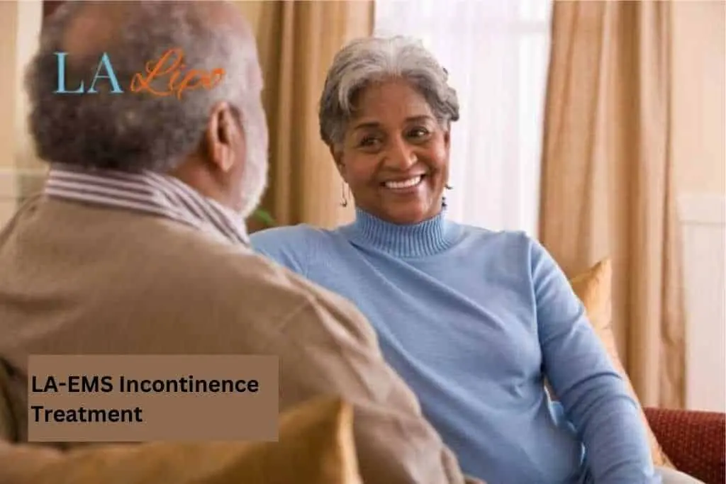 Couple sat smiling at each other - LA-EMS treatment Batley