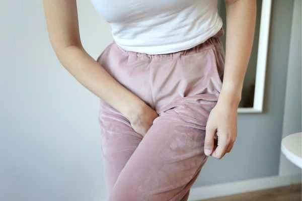 woman running for the toilet because of urinary incontinence Batley